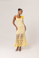 Yellow chiffon midi dress by Andreeva with handmade crochet details, featuring a flowy, elegant design perfect for special occasions.