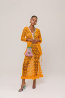 Handmade orange crochet shirt featuring California poppy design by Andreeva, casual and vibrant fashion piece.