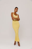 Yellow metallic knit maxi dress by Andreeva featuring a fitted silhouette and long sleeves.