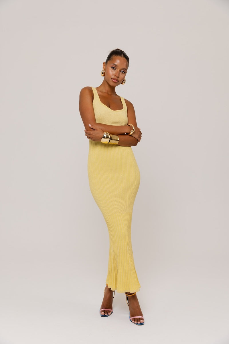 Yellow metallic knit maxi dress by Andreeva featuring a fitted silhouette and long sleeves.