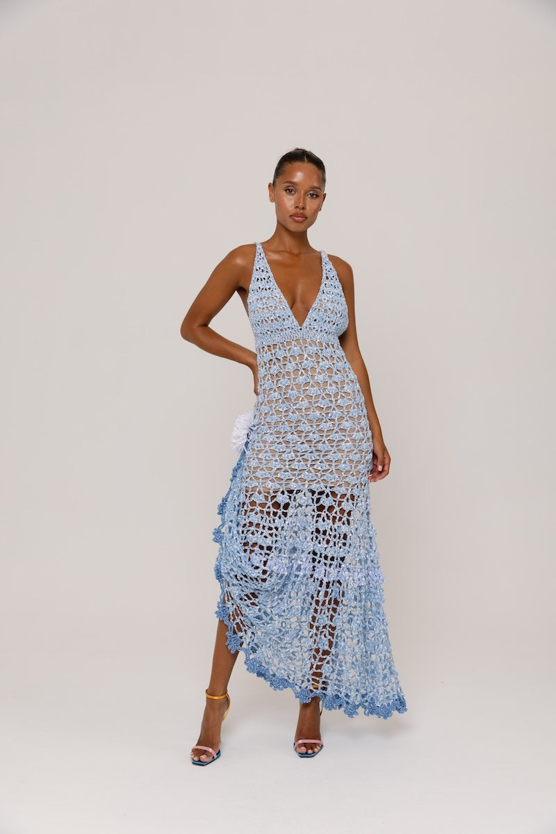 Handmade metallic iris crochet maxi dress by Andreeva, featuring intricate crochet details and flowing fabric in a shimmering finish.