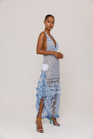 Handmade metallic iris crochet maxi dress by Andreeva featuring intricate crochet details and flowing fabric.
