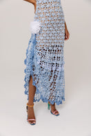 Metallic iris handmade crochet maxi dress by Andreeva, featuring intricate crochet details and flowing fabric in a vibrant, eye-catching design.