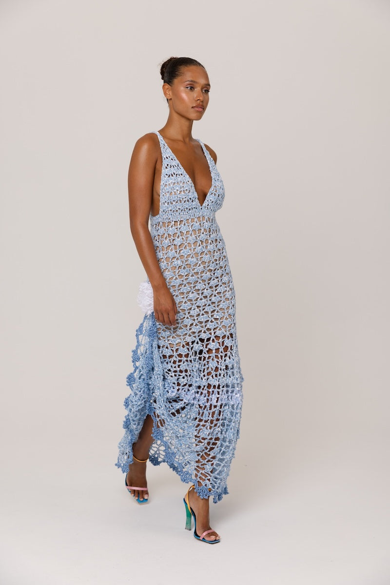 Handmade metallic iris crochet maxi dress by Andreeva featuring intricate crochet patterns and flowing fabric.