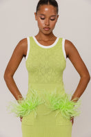 Apple green knit midi dress by Andreeva, featuring a fitted silhouette and long sleeves, styled for casual or semi-formal wear.