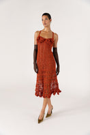 Handmade terracotta chrysanthemum crochet midi dress by Andreeva, featuring intricate floral crochet details and a flowing silhouette.