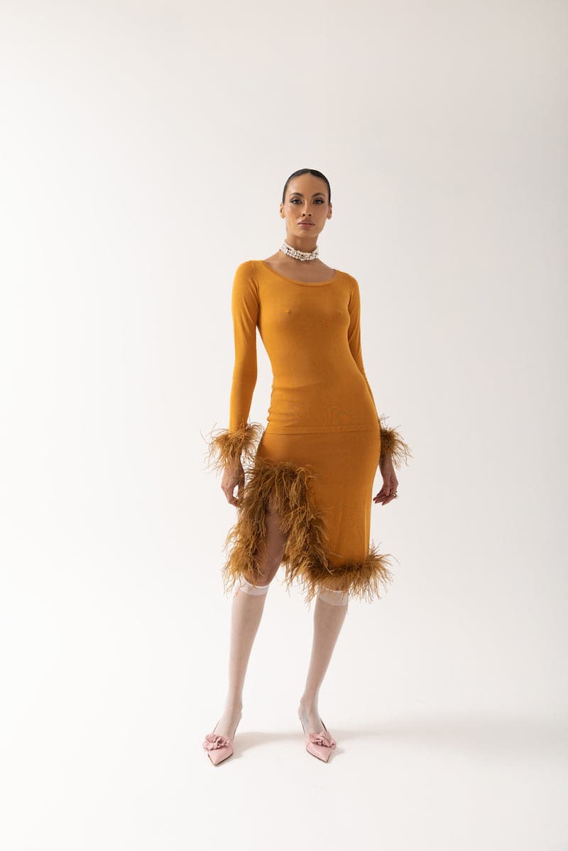 Andreeva camel knit top with stylish detachable feather cuffs, soft fabric, and a cozy, fashionable design.