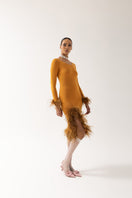 Andreeva camel knit top with detachable feather cuffs, long sleeves, and a stylish, cozy design for casual or dressy wear.