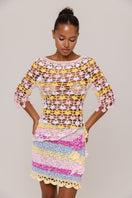 Handmade crochet top by Andreeva featuring pink and yellow floral designs, perfect for casual or summer wear.