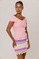 Pink knit top by Andreeva featuring a cozy, stylish design, perfect for casual wear.