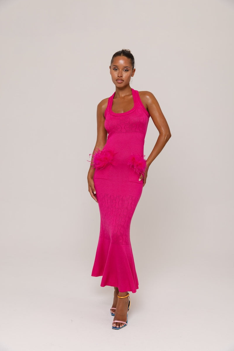 Andreeva Camellia knit maxi dress with long sleeves and a relaxed fit, perfect for casual or elegant occasions.