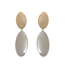 Silver and gold earrings from Silvia Gnecchi's TARA IN collection, featuring elegant design and mixed metal accents.