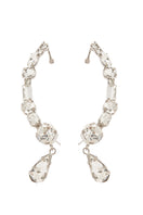 Silver Cassidy earrings by Silvia Gnecchi featuring elegant, minimalist design with sleek silver hoops and subtle details.