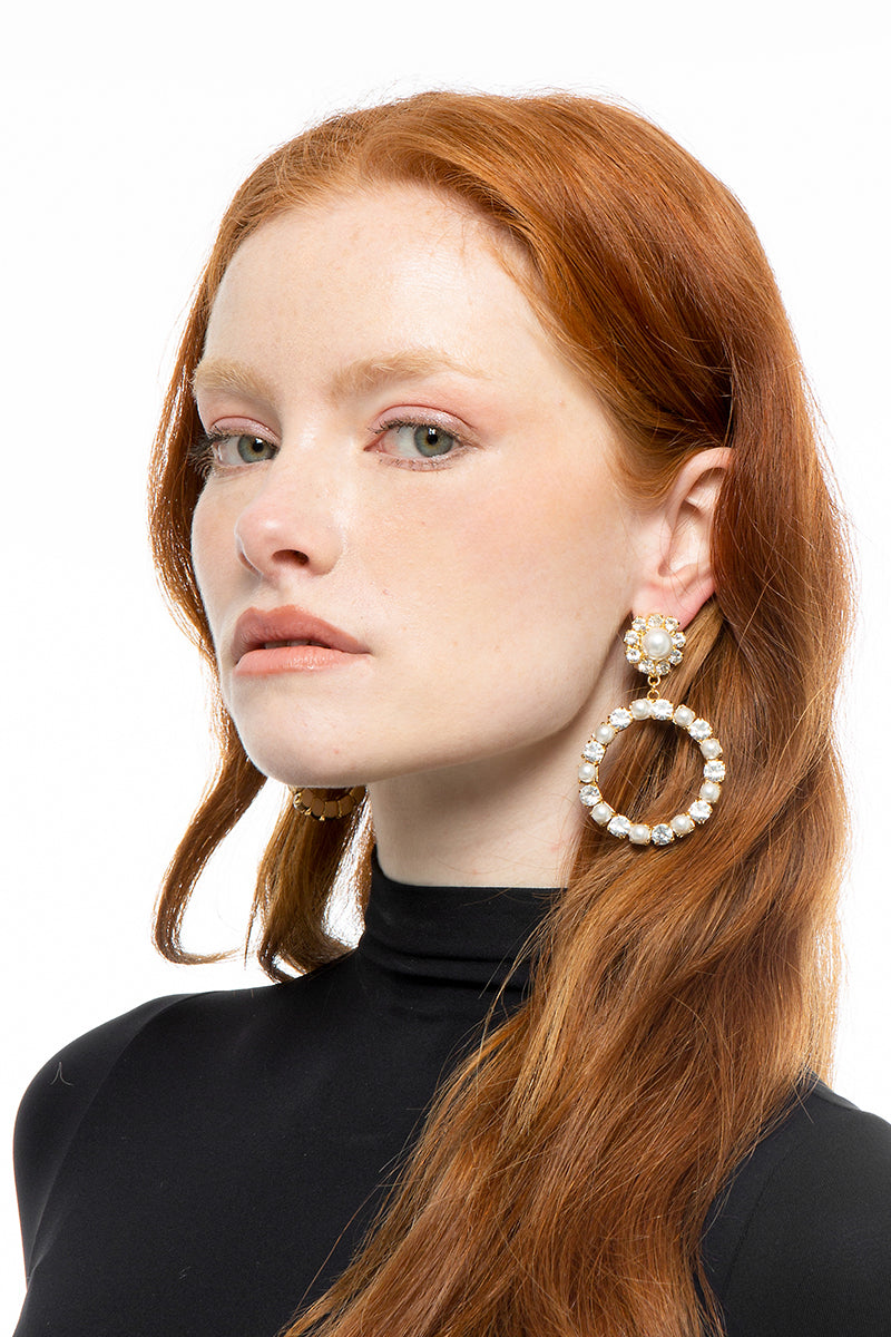 Silver LIEVNA earrings by Silvia Gnecchi featuring elegant, modern design with smooth, polished surfaces and intricate details.