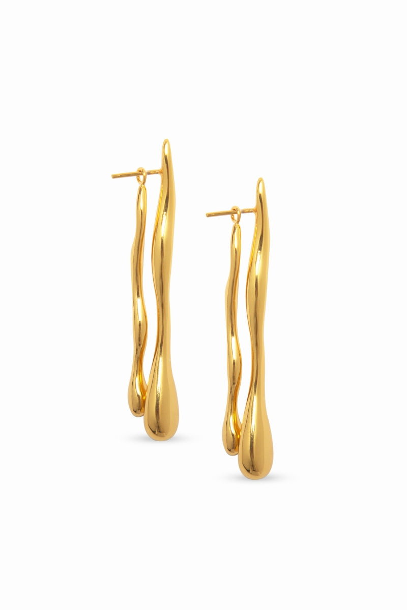 Gold Eugenia Ospina Origén earrings featuring sleek, modern design with polished gold finish and elegant hoop style.