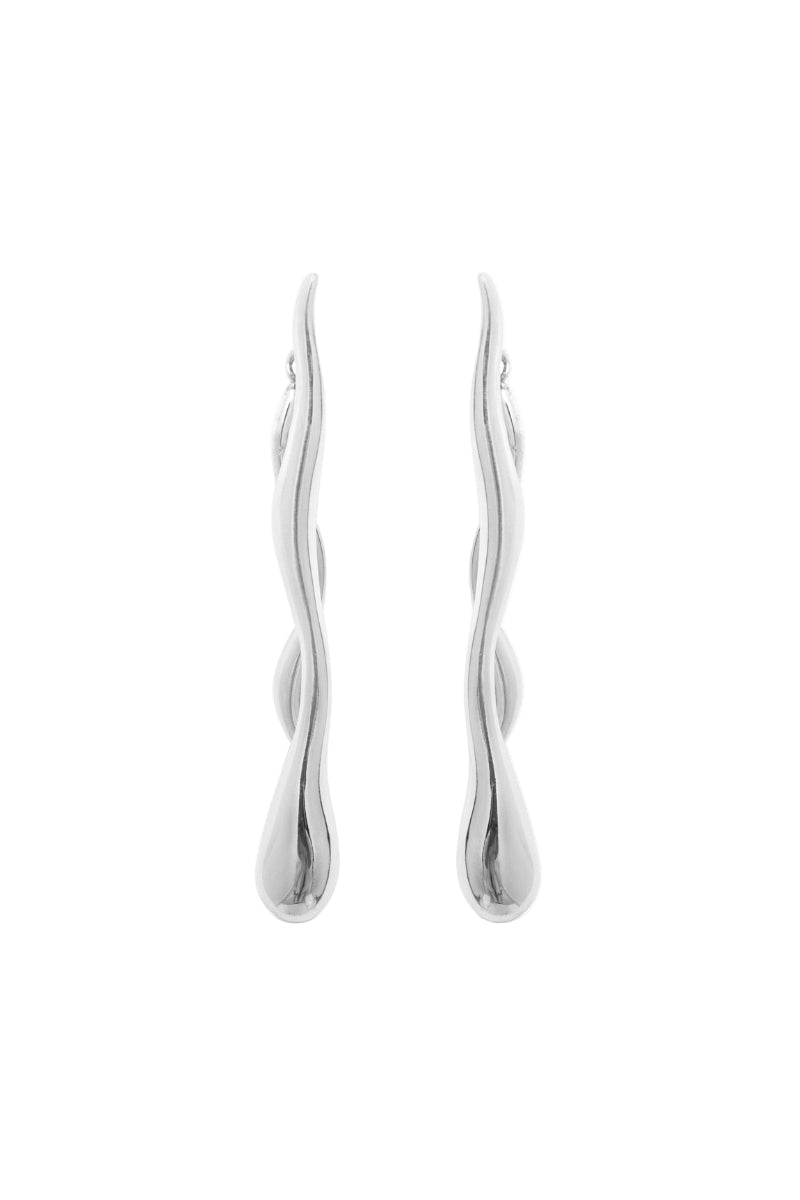 Silver earrings by Eugenia Ospina featuring elegant, handcrafted designs with intricate details for stylish accessories.
