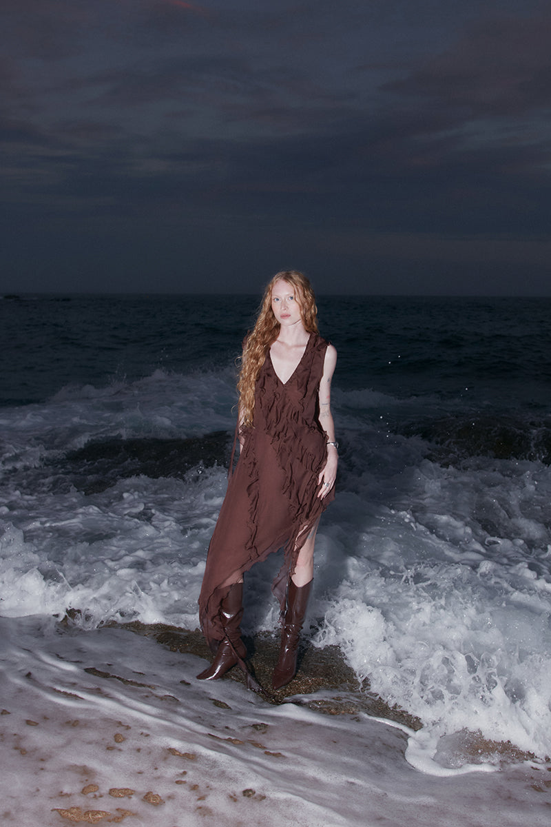 OvertheSea Mirage Brown Mini Dress showing fitted silhouette and stylish design on model.