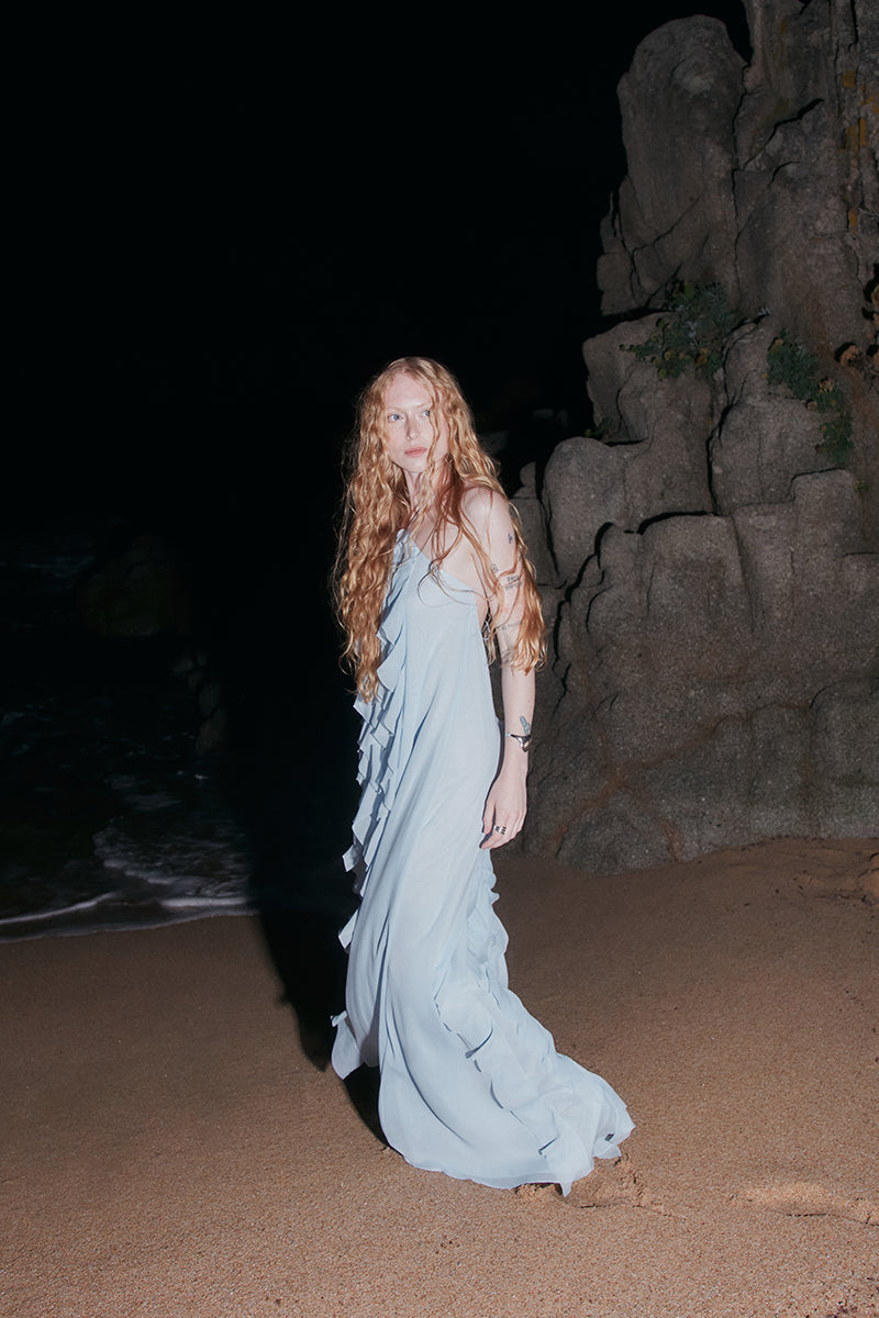 Sky blue AQUA dress by OVERTHESEA, a flowing maxi dress with a relaxed fit and elegant design, perfect for summer wear.