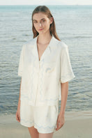 Manito Ocean Wave Silk Short Pajama Set for women, featuring a smooth, lightweight silk fabric with ocean-inspired wave patterns.