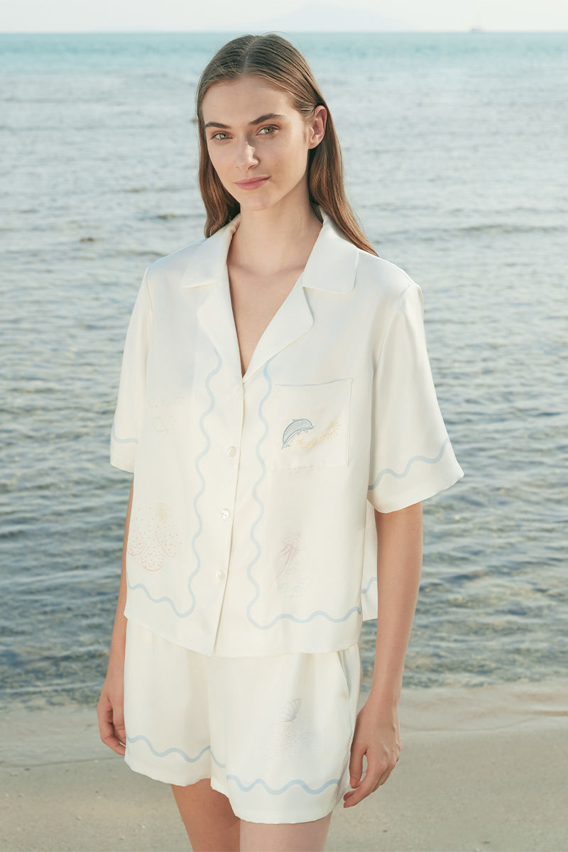 Manito Ocean Wave Silk Short Pajama Set for women, featuring a smooth, lightweight silk fabric with ocean-inspired wave patterns.