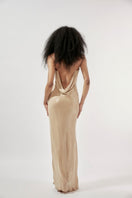 Deme By Gabriella Oceana nude beige sequin gown with intricate beadwork and flowing fabric, elegant evening wear for special occasions.