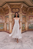 Ivory dot midi dress from Summer Away's Odessa collection, featuring a flowy silhouette and elegant design.