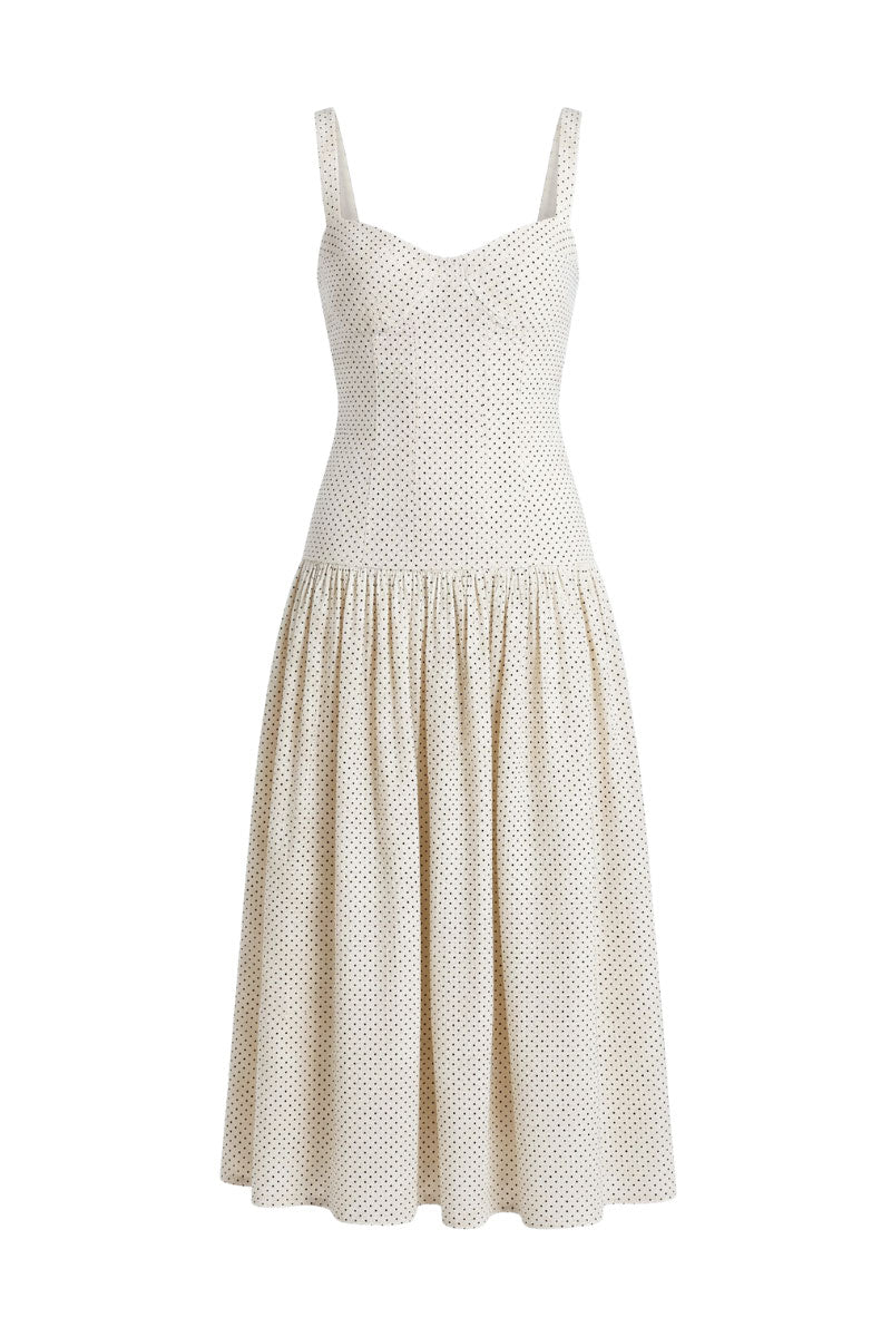 Ivory dot Odessa midi dress by Summer Away featuring a flowy silhouette and delicate pattern, perfect for casual or semi-formal occasions.