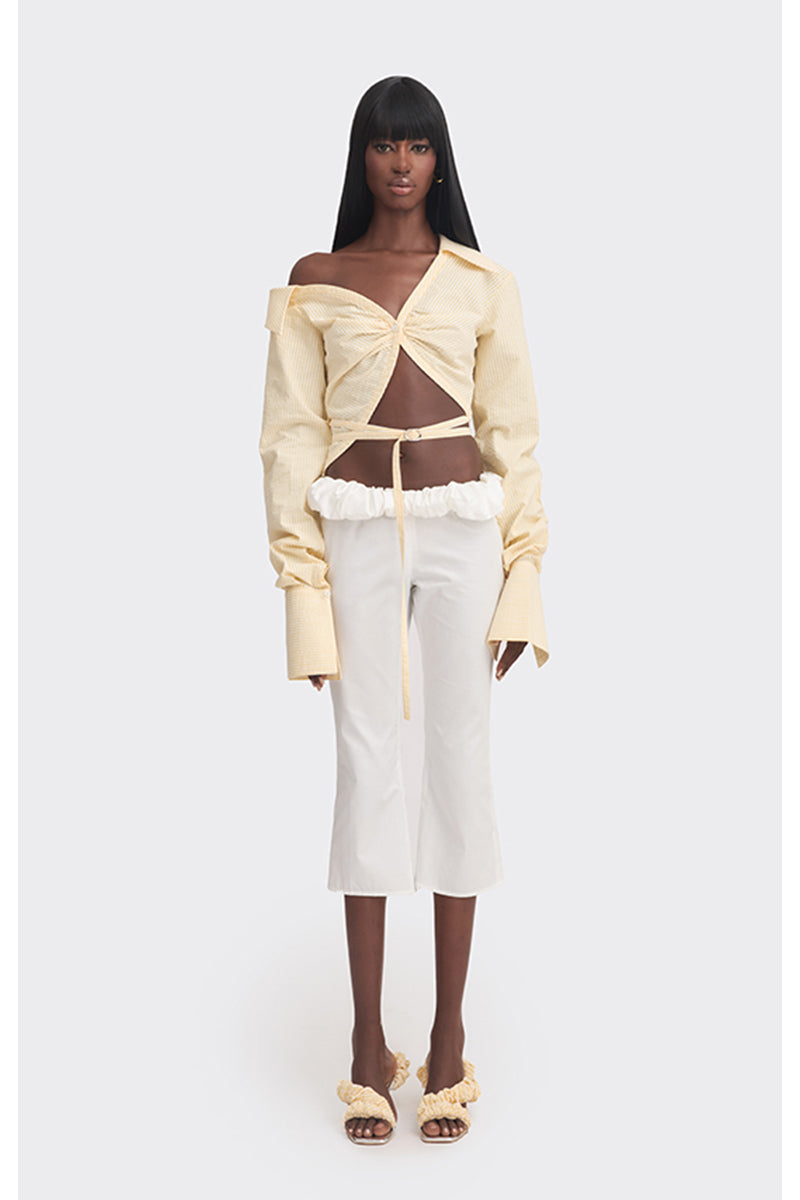 Yellow off-shoulder cropped stripe shirt by Stolen Stores, featuring a stylish and trendy design perfect for casual wear.