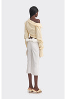 Yellow off-shoulder cropped striped shirt from Stolen Stores, styled as a trendy women's tops with a casual fit.