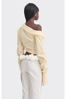 Yellow off-shoulder cropped striped shirt by Stolen Stores, featuring a stylish and casual top with bold stripe pattern.