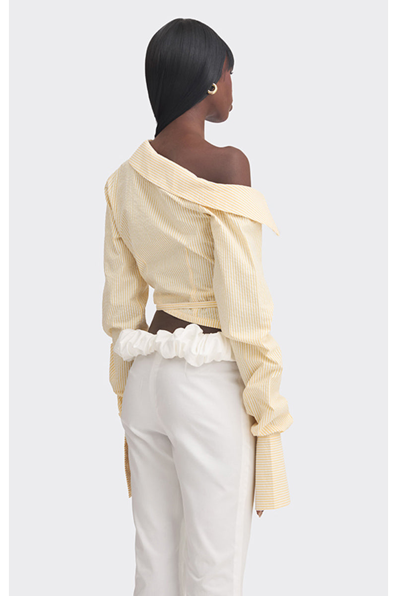 Yellow off-shoulder cropped striped shirt by Stolen Stores, featuring a stylish and casual top with bold stripe pattern.