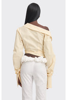 Yellow off-shoulder cropped striped shirt from Stolen Stores, featuring a stylish, casual tops design with a relaxed fit.