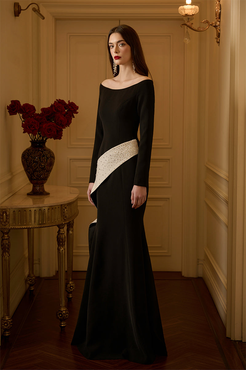 Elegant I.H.F Mika crepe and taffeta off-shoulder mermaid gown with diagonal side strap, showcasing a sleek, fitted silhouette.