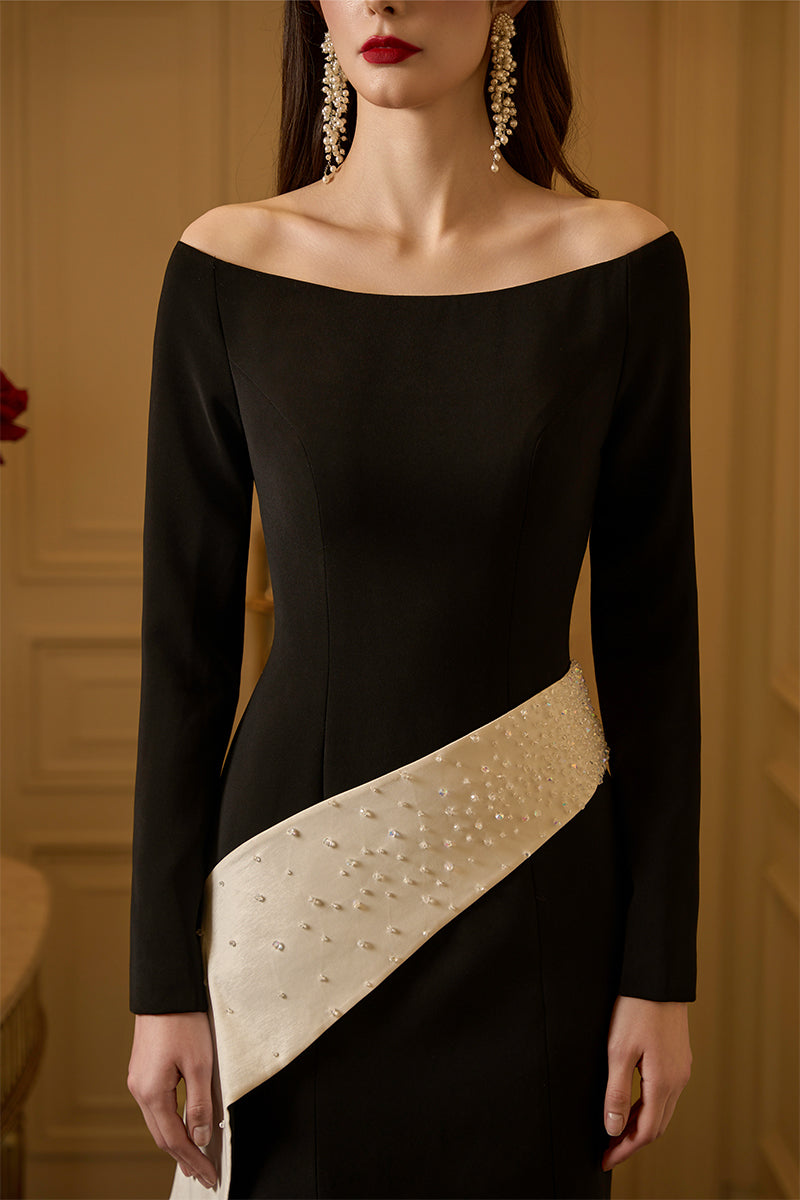 Off-shoulder mermaid gown with diagonal side strap from I.H.F's Mika crepe and taffeta collection.