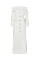 White off-shoulder long shift dress by Valenciani, featuring a flowing maxi dress design with elegant off-shoulder sleeves.