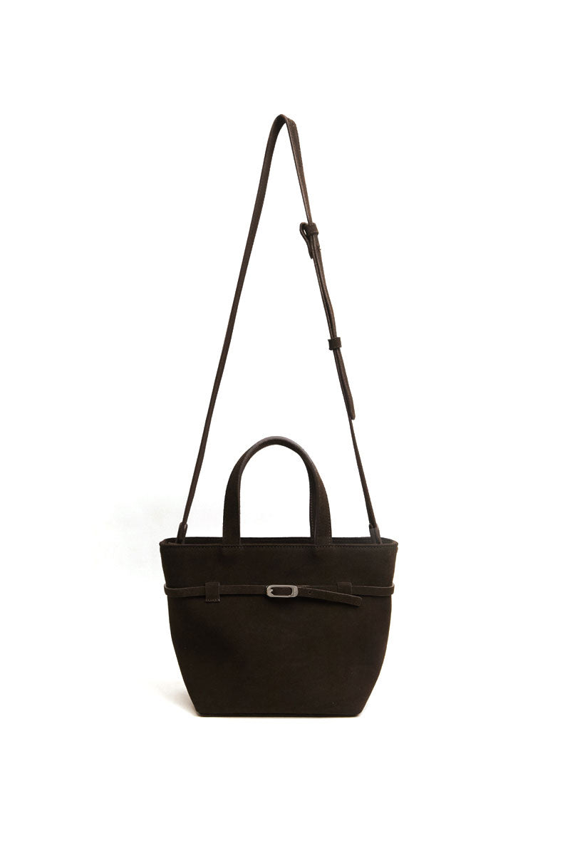 TUEAM'S Olvia crossbody bag in brown with top handle and adjustable strap, showing the stylish design and textured leather surface.