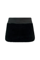 Black mini skirt by Lorena Saravia, featuring a stylish and fitted design, shown on a model with a sleek, modern look.