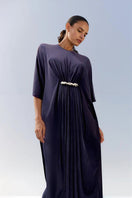 SemSem navy jersey maxi dress with crystal detail, worn by a model, featuring a flowing silhouette and elegant design.