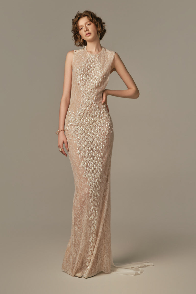 White POEM Ondine gown displayed on a model, featuring elegant fabric and flowing design for sophisticated evening wear.