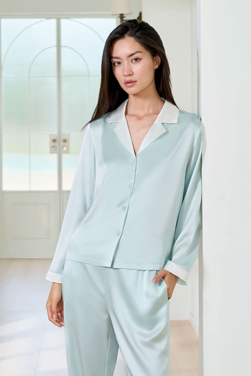 Green silk women's pajama set by MANITO featuring a comfortable, elegant design with a relaxed fit and soft fabric.