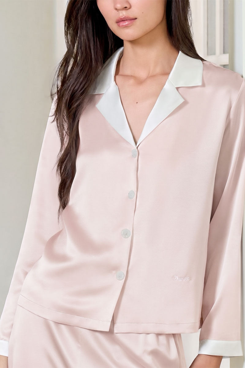 Pink silk pajama set for women by MANITO, featuring a comfortable, elegant design in a soft, luxurious fabric.