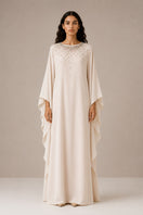 Nihan Peker Opaline Vanilla gown featuring elegant fabric and flowing design, suitable for formal occasions.