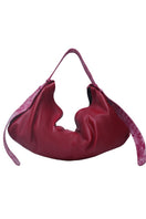 Red oversized leather shoulder bag from Double A's Ophelia II collection with sturdy handles and spacious interior.