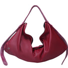 Red oversized leather shoulder bag from the Double A Ophelia II collection, stylishly displayed with handles and spacious interior.