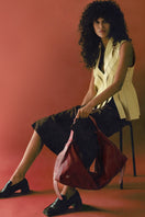 Red oversized leather shoulder bag by Double A, Ophelia II model, featuring a spacious design and sleek leather finish.