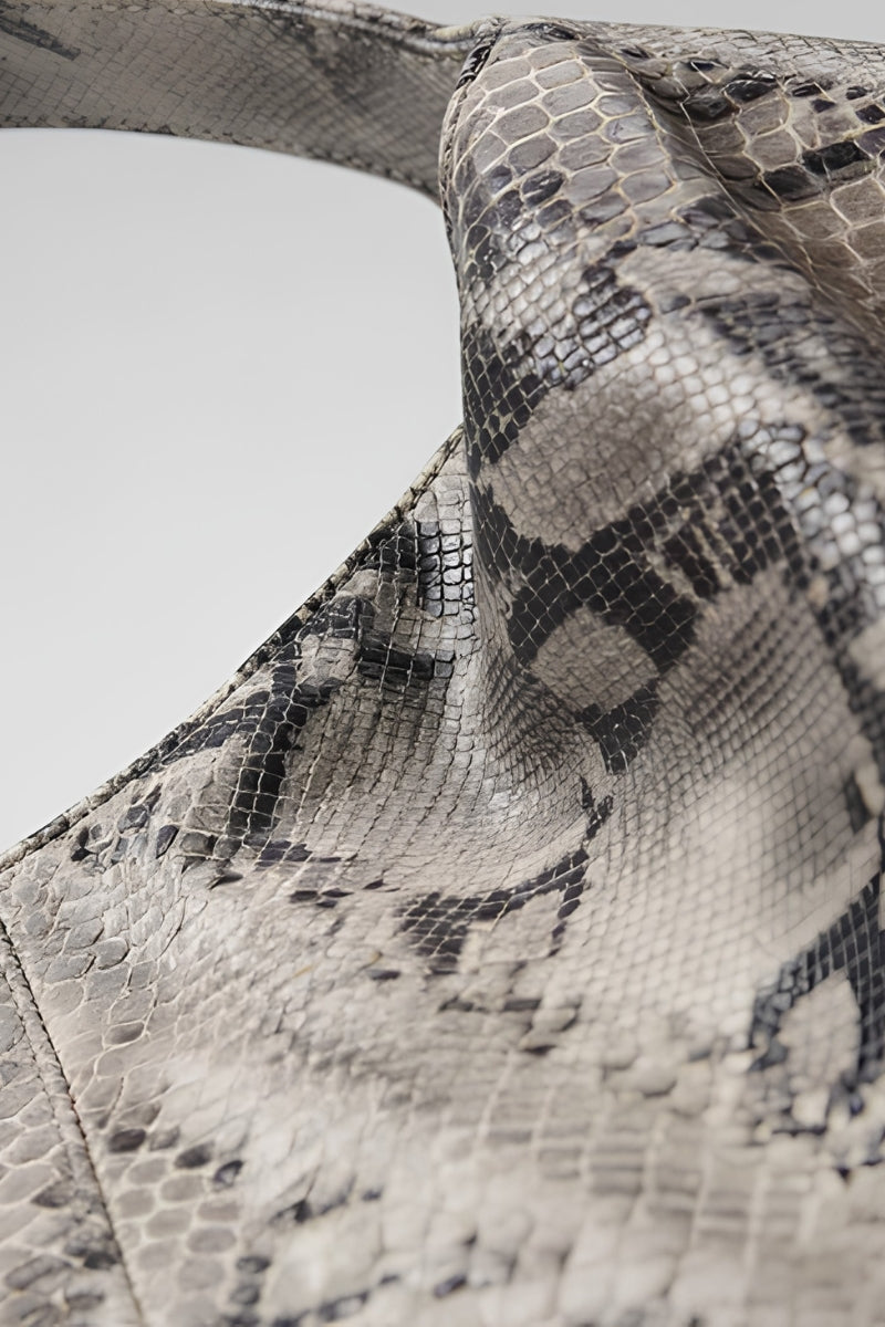 Double A Ophelia oversized shoulder bag in snakeprint with bold design and spacious interior, perfect for stylish everyday use.