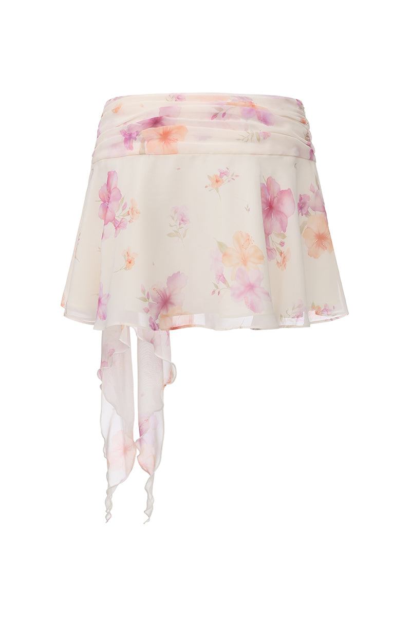 Nana Jacqueline Ophelia floral mini skirt in beige with rosette print, shown from the back.