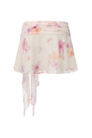Nana Jacqueline Ophelia floral mini skirt in beige with rosette print, shown from the back.