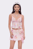Beige floral print mini skirt by Nana Jacqueline, featuring a flattering fit and delicate rose pattern.