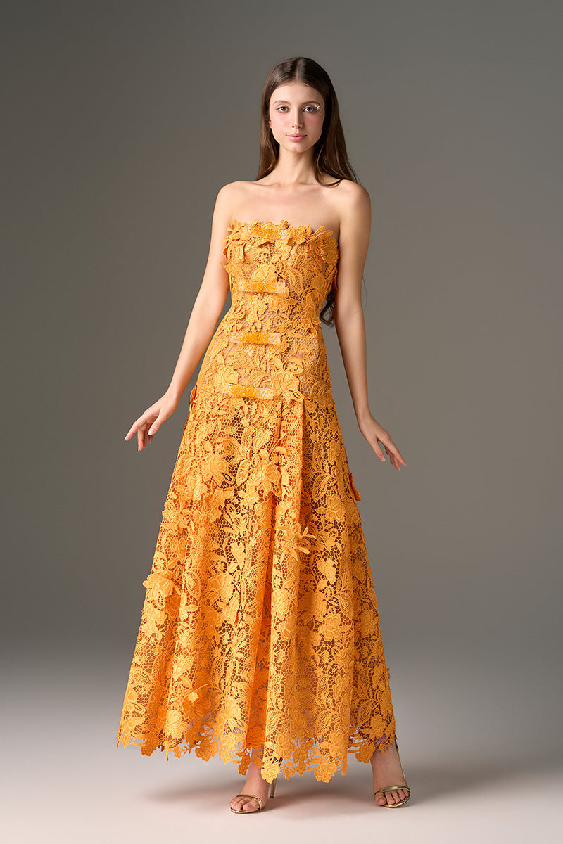 Orange floral print strapless A-line maxi dress by I.H.F Studio with a flowing silhouette and vibrant garden-inspired pattern.